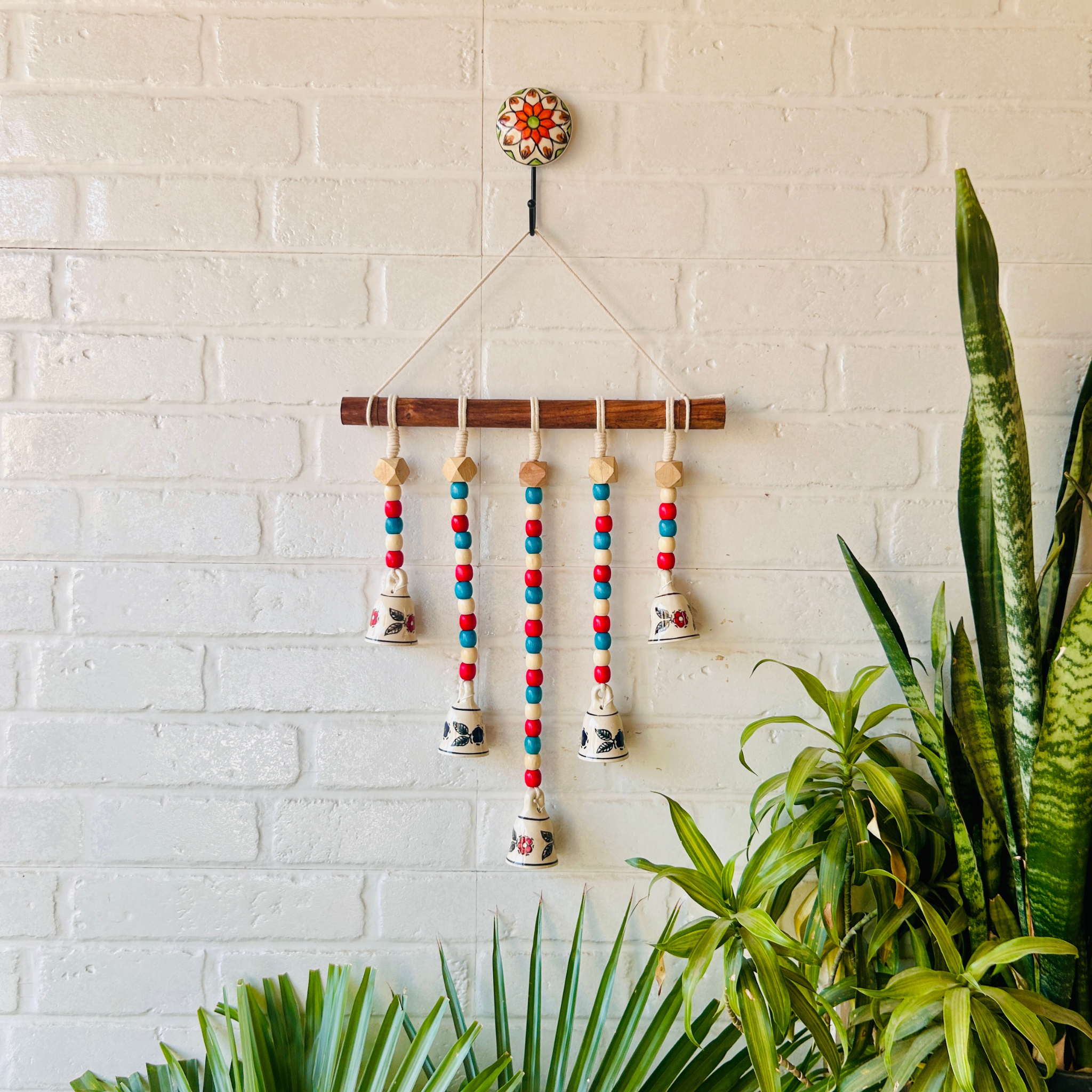 5 Bead Bell on a wooden dowel
