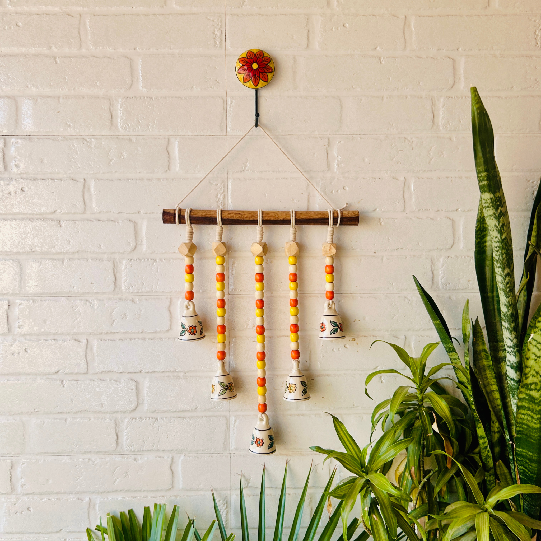 5 Bead Bell on a wooden dowel