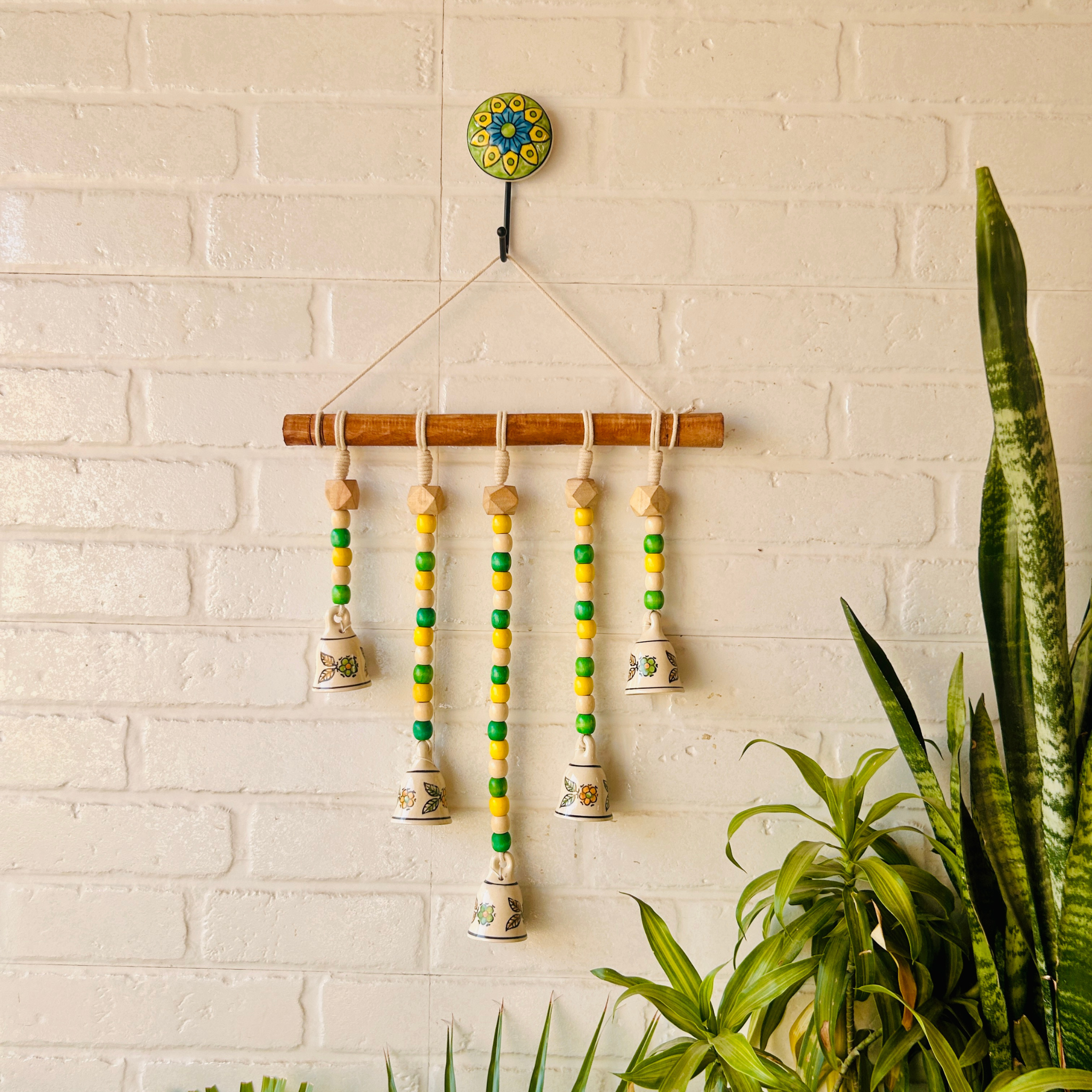 5 Bead Bell on a wooden dowel