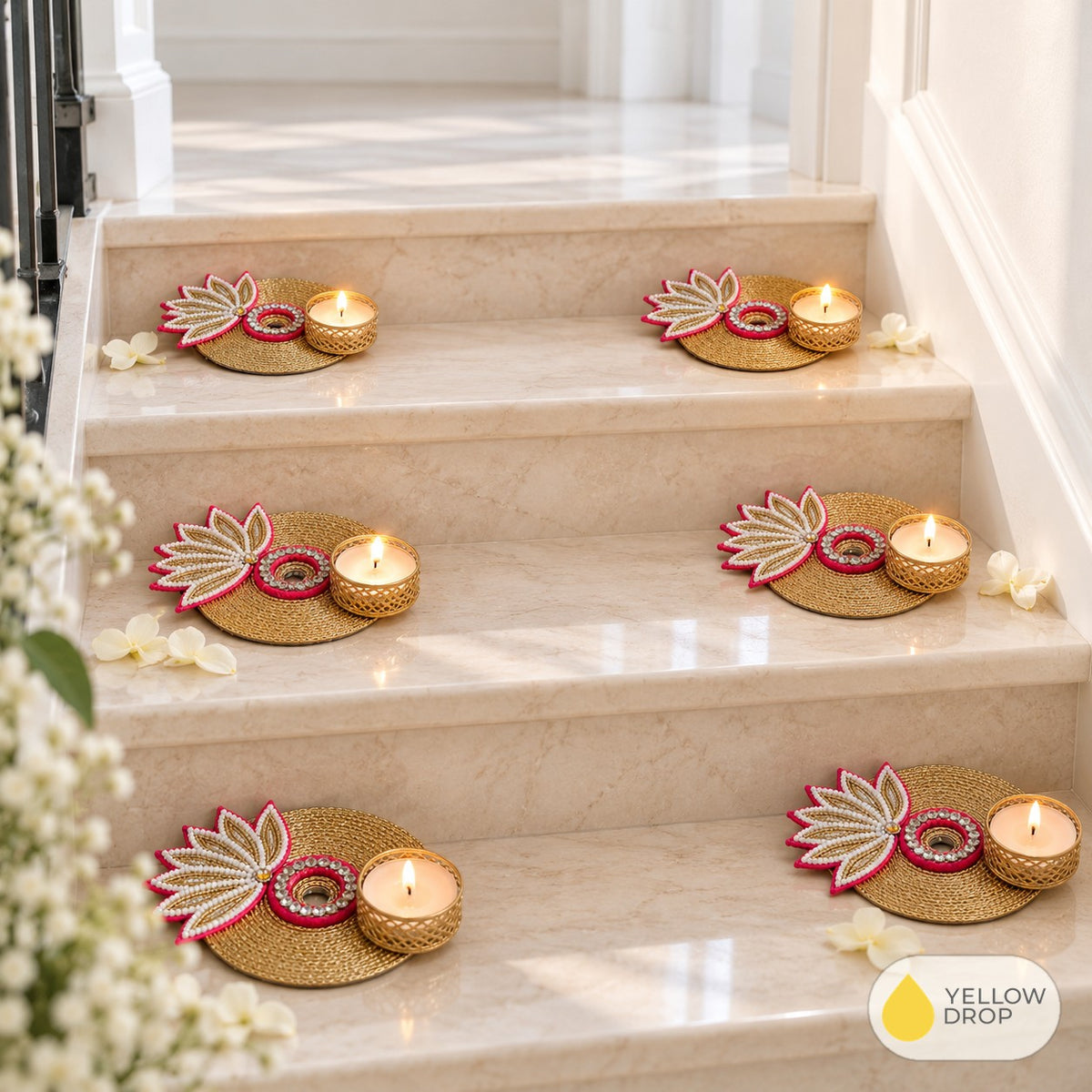 Pink Lotus Gold Tealight Holders on a staircase