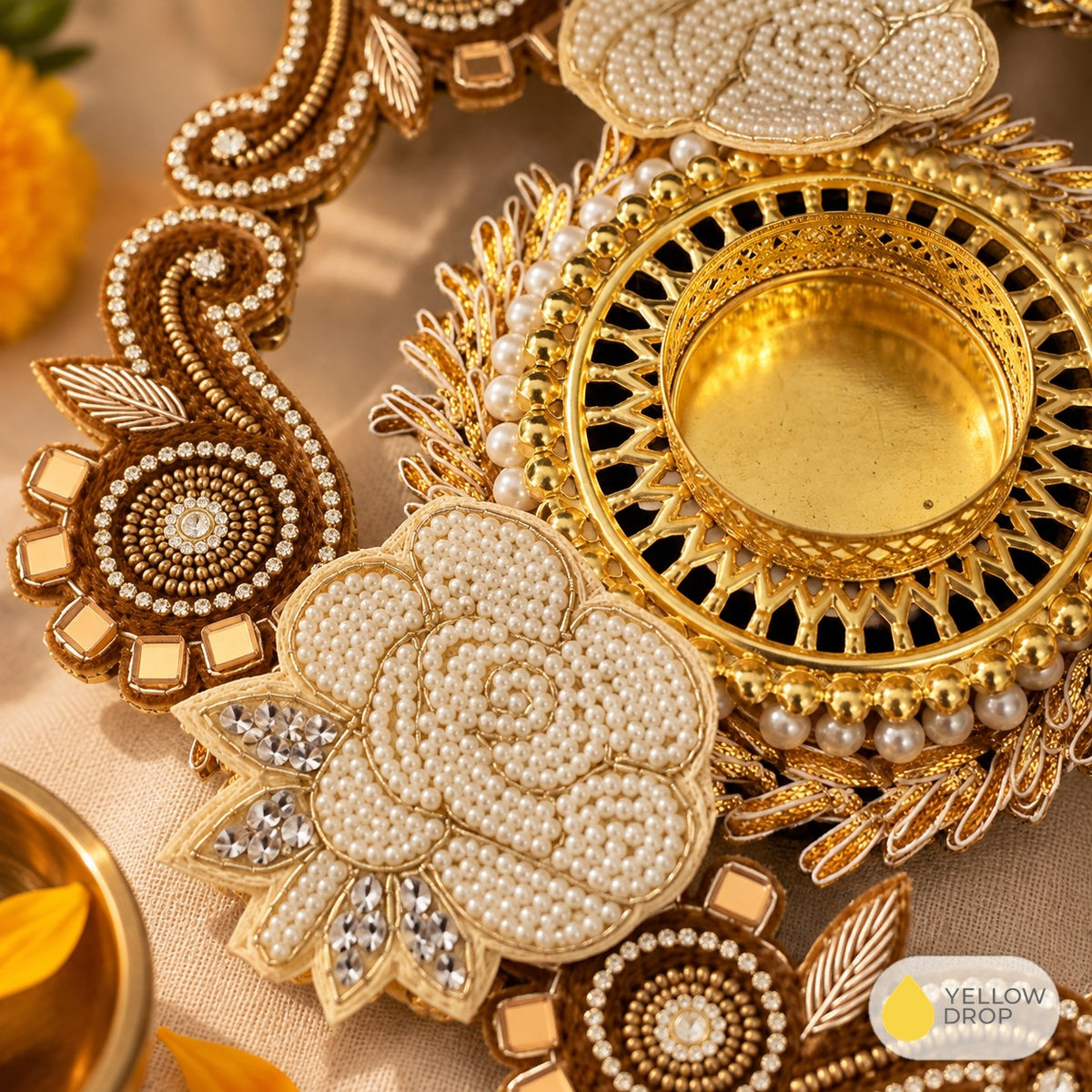 Close-up of pearl rose and gold filigree cup