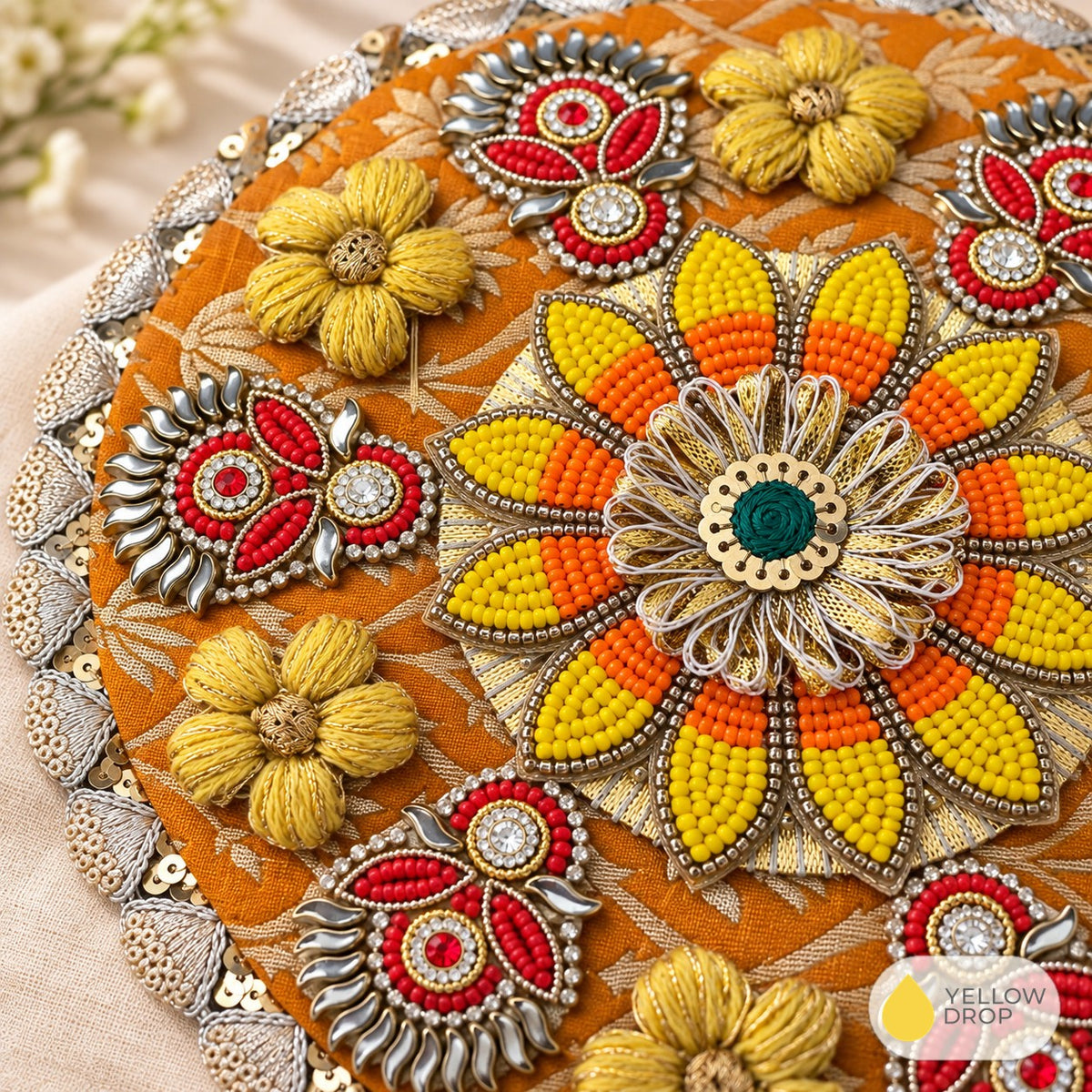 Close-up of bead and zardosi mandala work