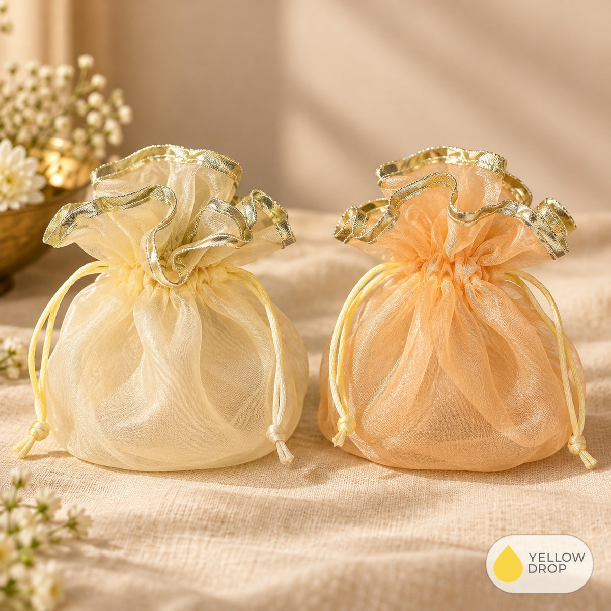 Ivory and peach organza potli bags