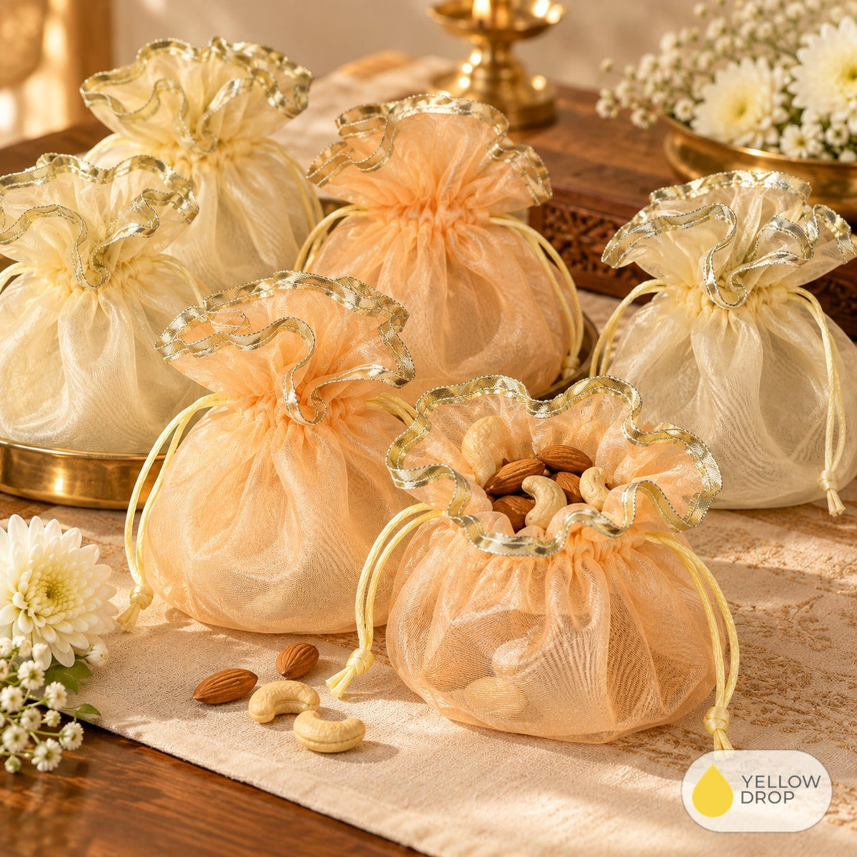 Organza potlis as return gifts with dry fruits
