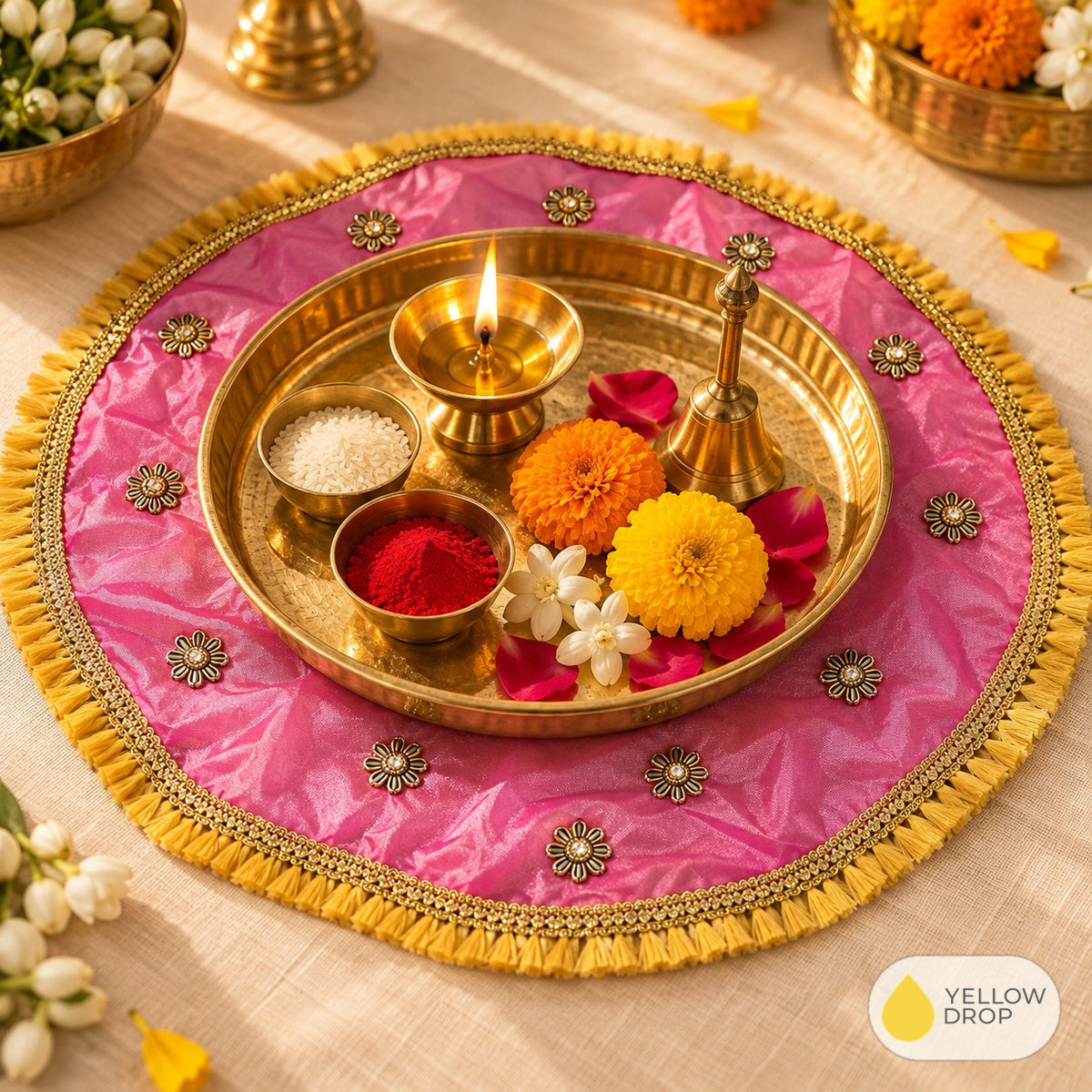 Lilac pooja cloth under a brass puja thali