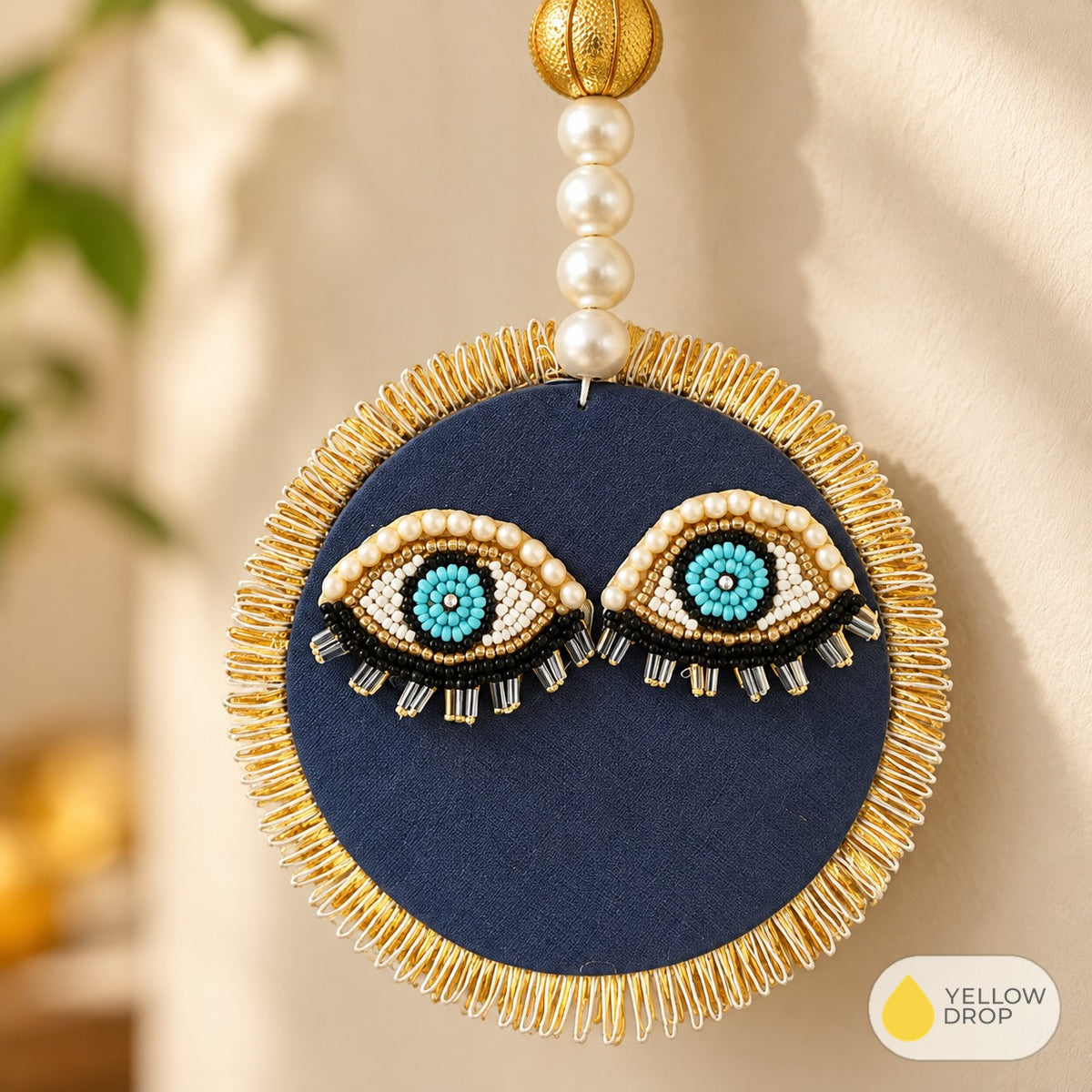 Close-up of beaded evil eyes