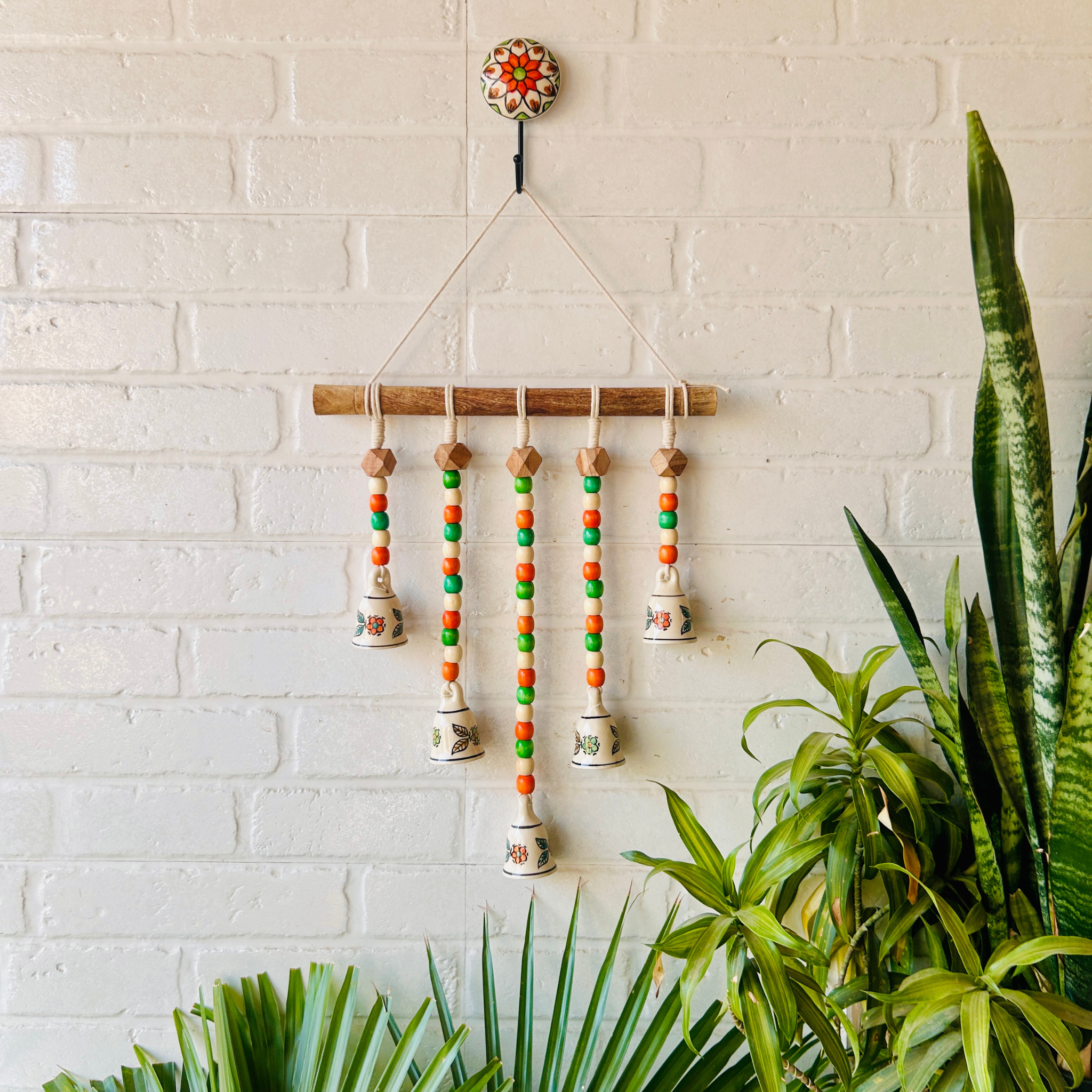5 Bead Bell on a wooden dowel
