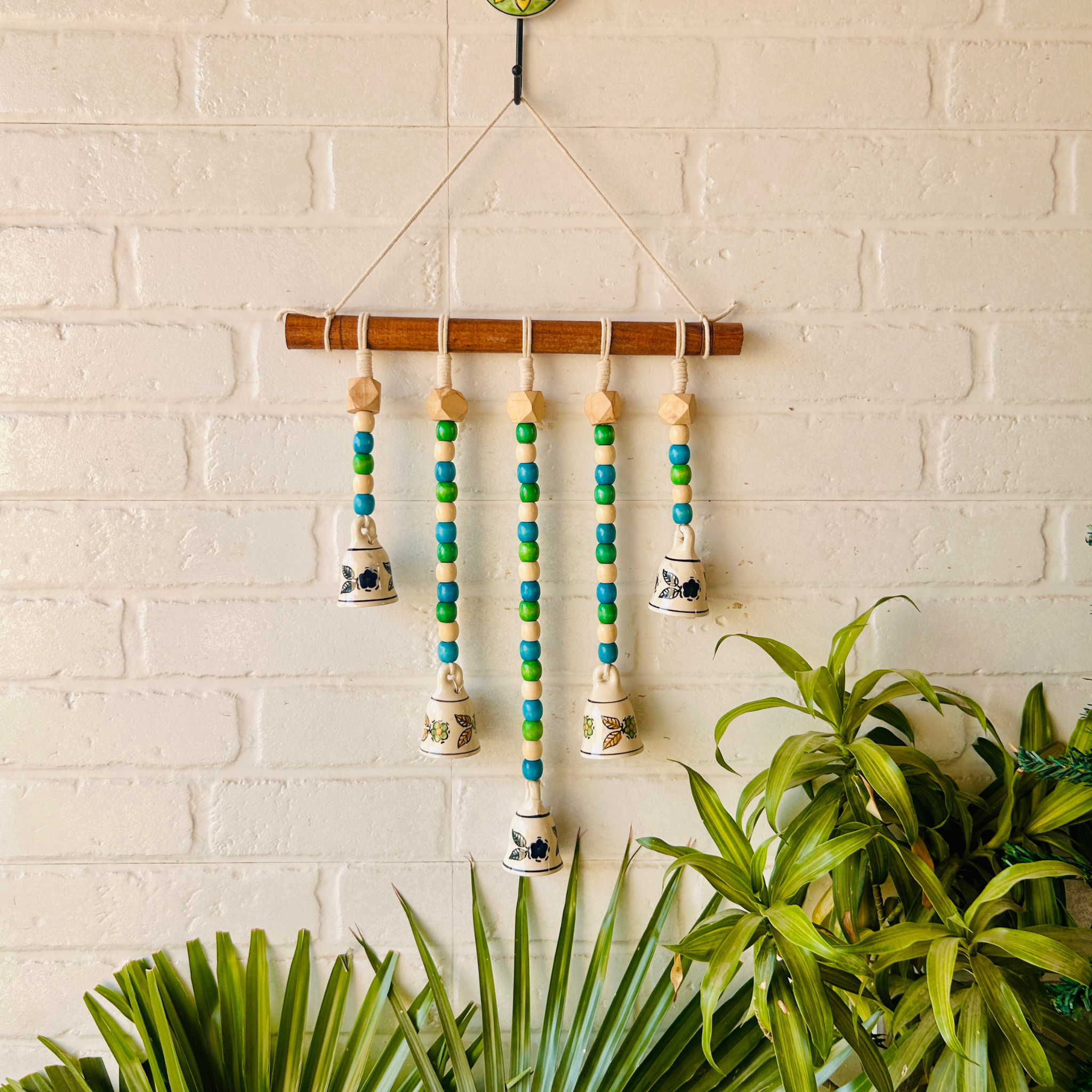 5 Bead Bell on a wooden dowel