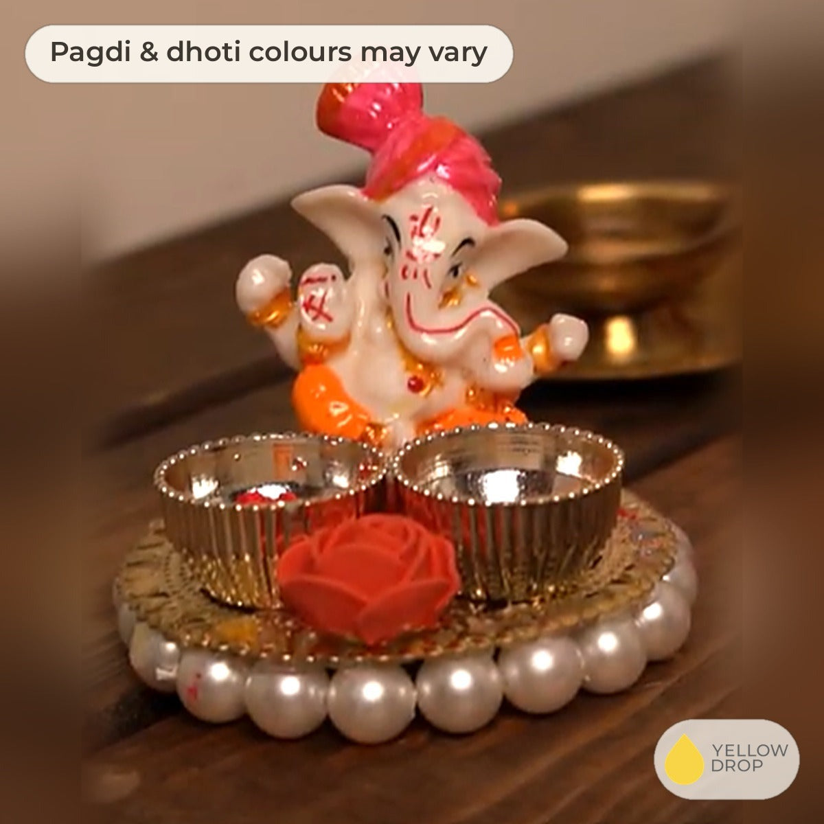Ganesha with rice and kumkum holder - pagdi and dhoti colours may vary