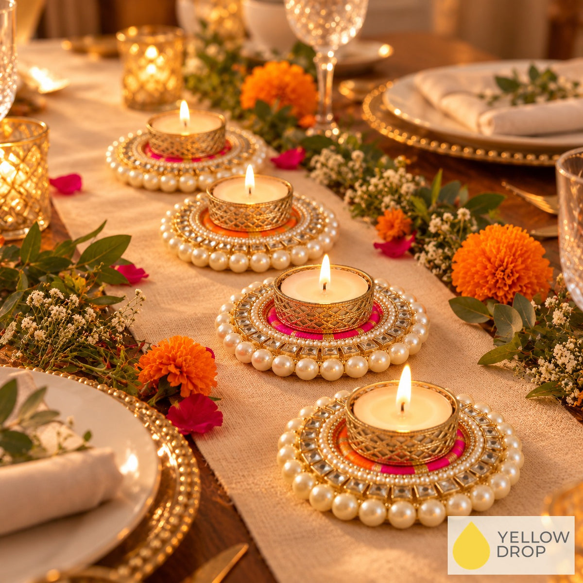 Kundan Pearl tealight holders lit along a festive Diwali dinner table runner
