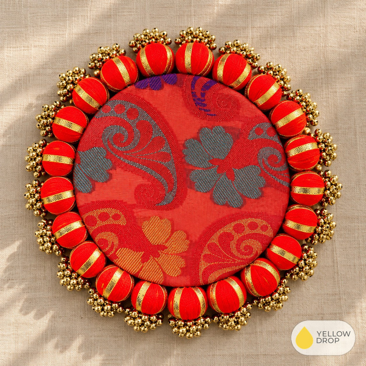 Ornate Red and Gold Textile Medallion