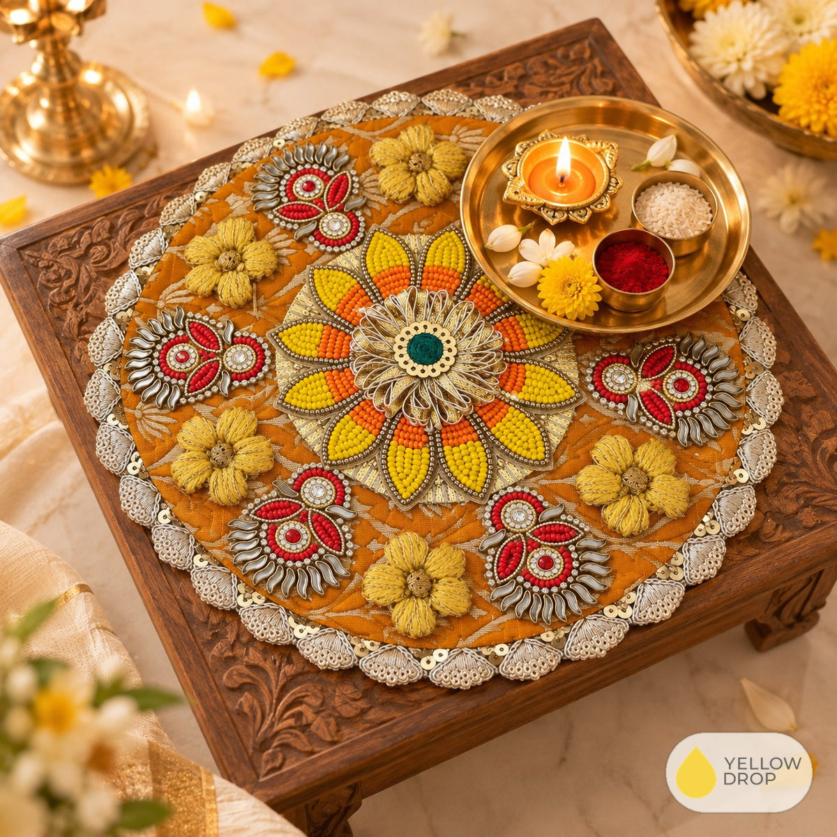 Beaded mandala mat under a puja thali on a chowki