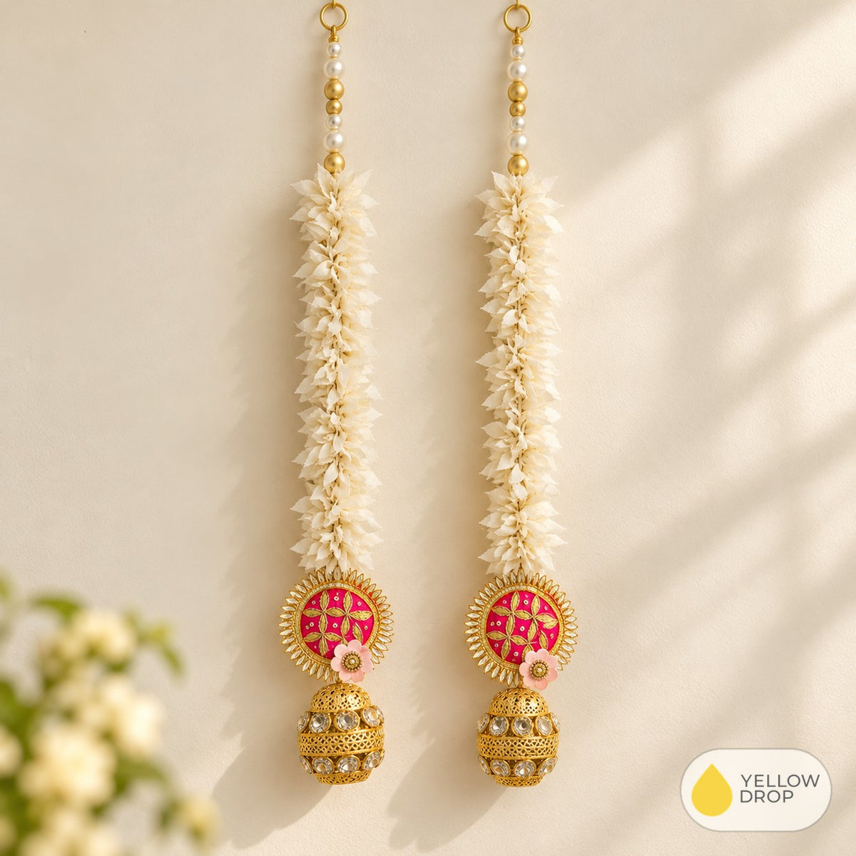 White floral latkan pair with pink charm