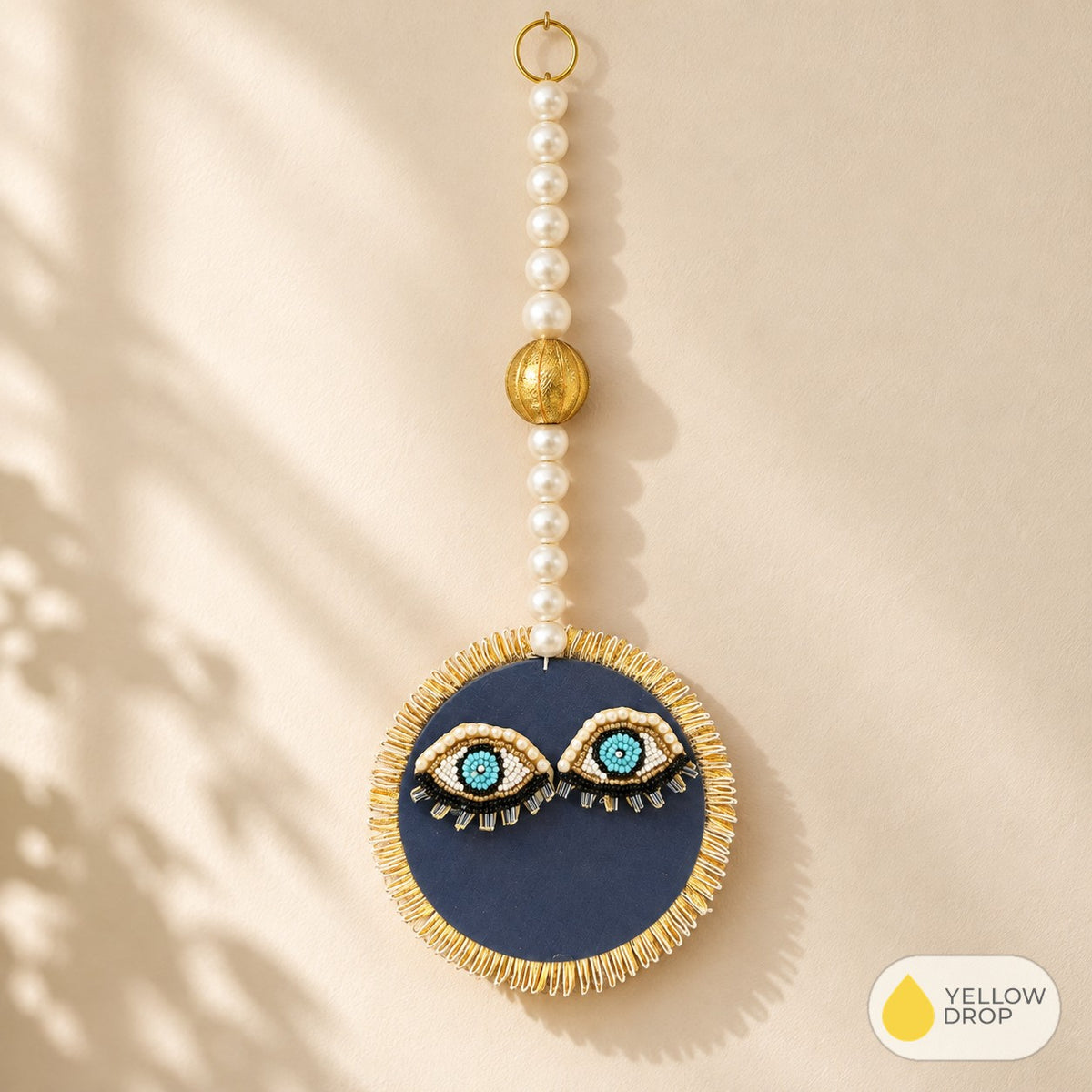 Evil eye beaded wall hanging
