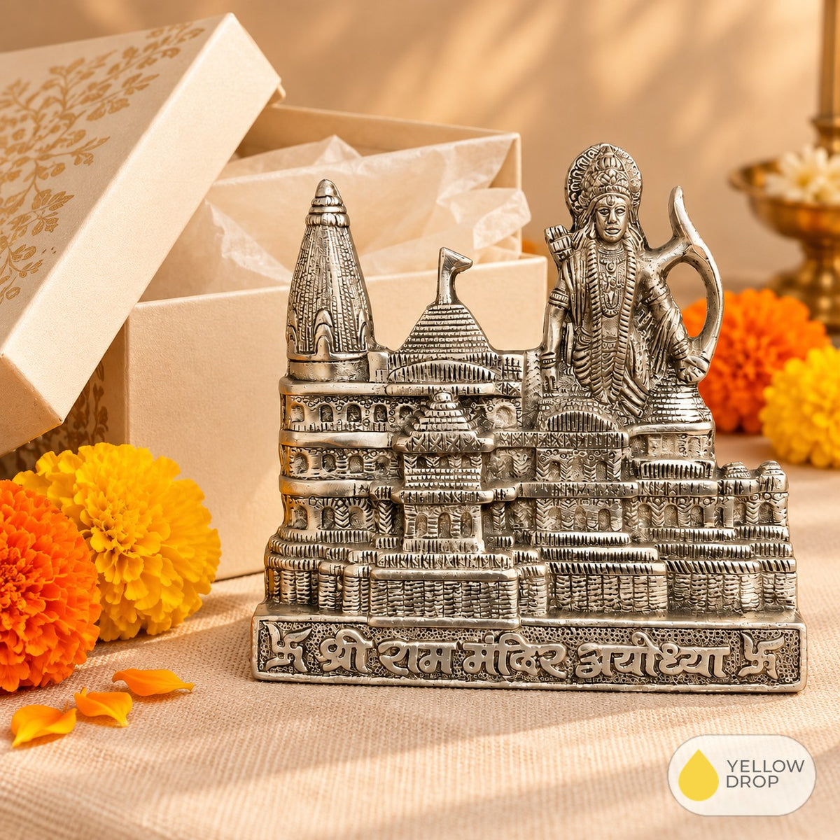 Ram Mandir frame with gift box and marigolds